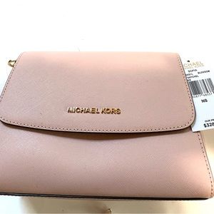 Michael kors bag looks new with tape 9 inches wide